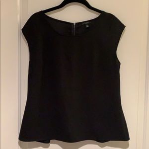 Short sleeve black top with long zipper back.